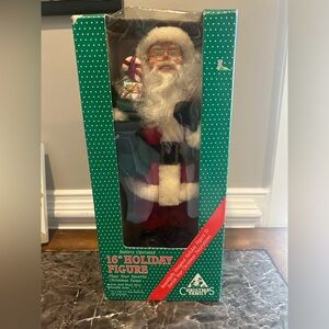 Vintage 16” Santa by Christmas Family plays your favorite Christmas tunes.